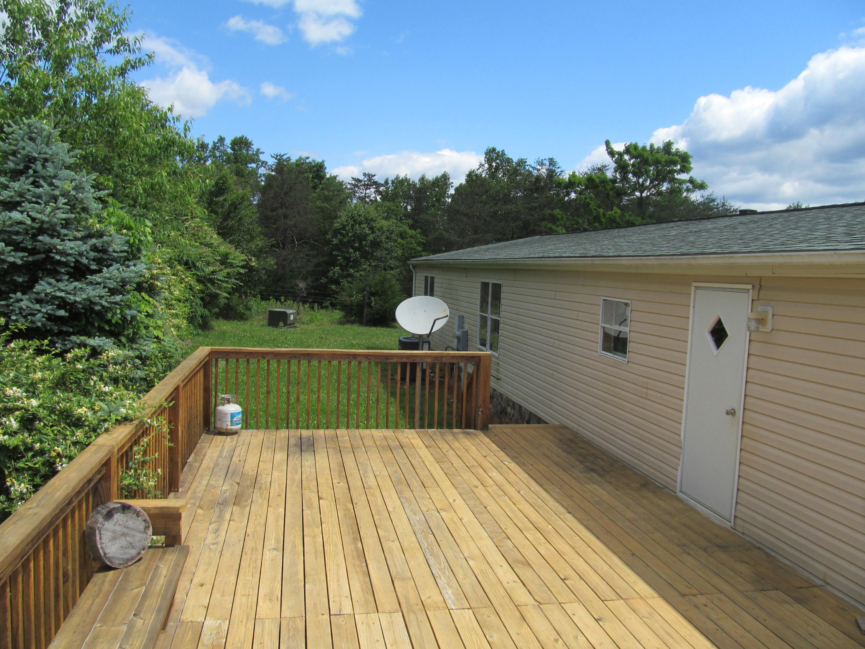 3016 Quarles Road Thaxton, VA 24174 - Photo 21 of 41 a view of balcony with wooden floor and fence