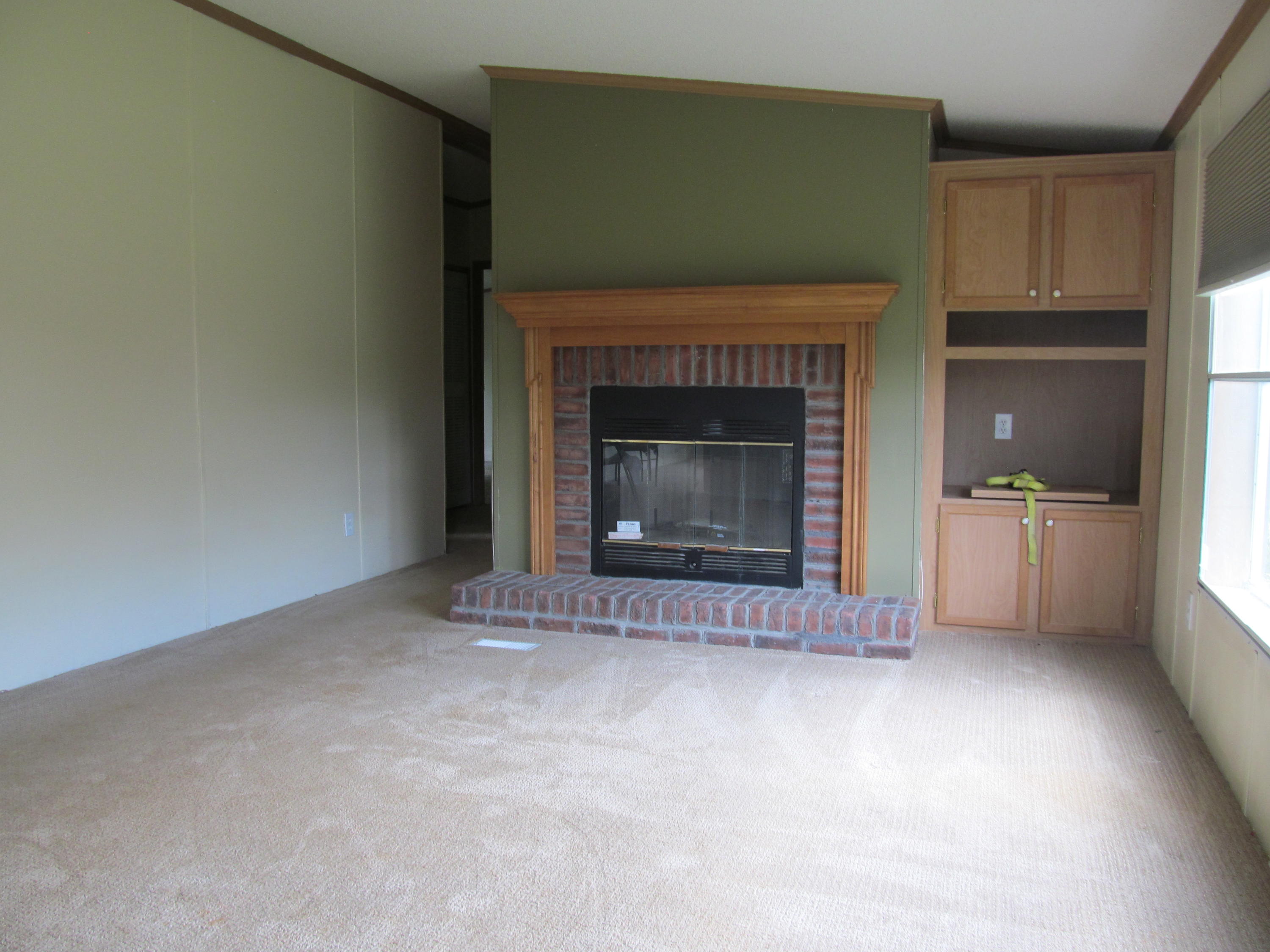 3016 Quarles Road Thaxton, VA 24174 - Photo 9 of 41 a living room with a fireplace