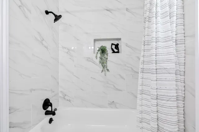 a bathroom with a bathtub