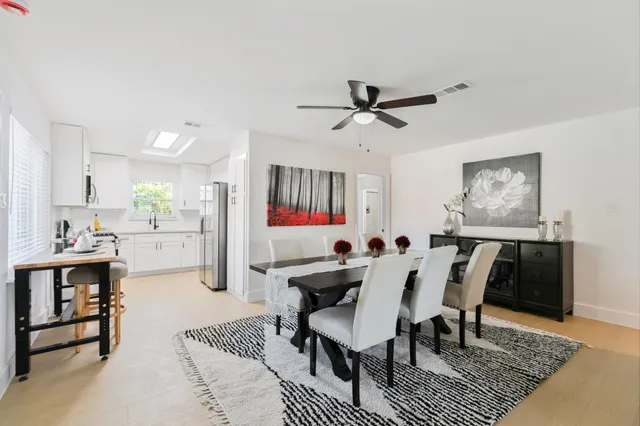 a view of a dining room with furniture