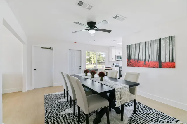 a view of a dining room with furniture