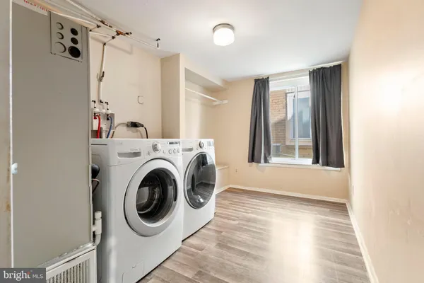 a utility room with dryer and washer