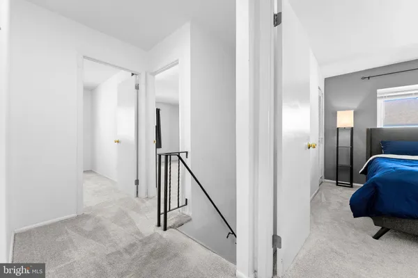 a view of hallway with a couch