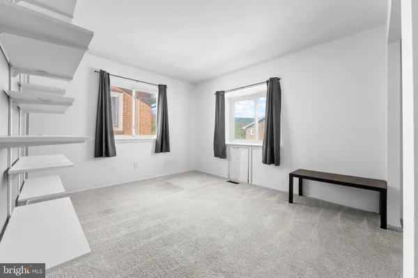 an empty room with windows