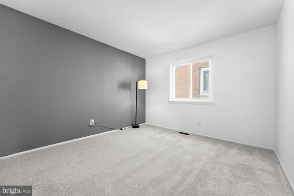 an empty room with window