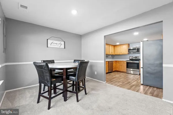 a view of a dining room with furniture