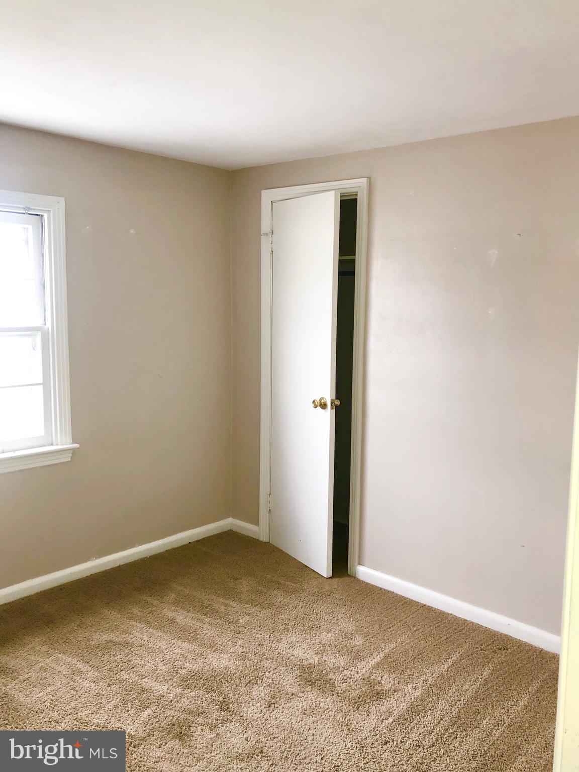50 Dymond Avenue, Unit B Fayetteville, PA 17222 - Photo 14 of 23 an empty room with a natural light