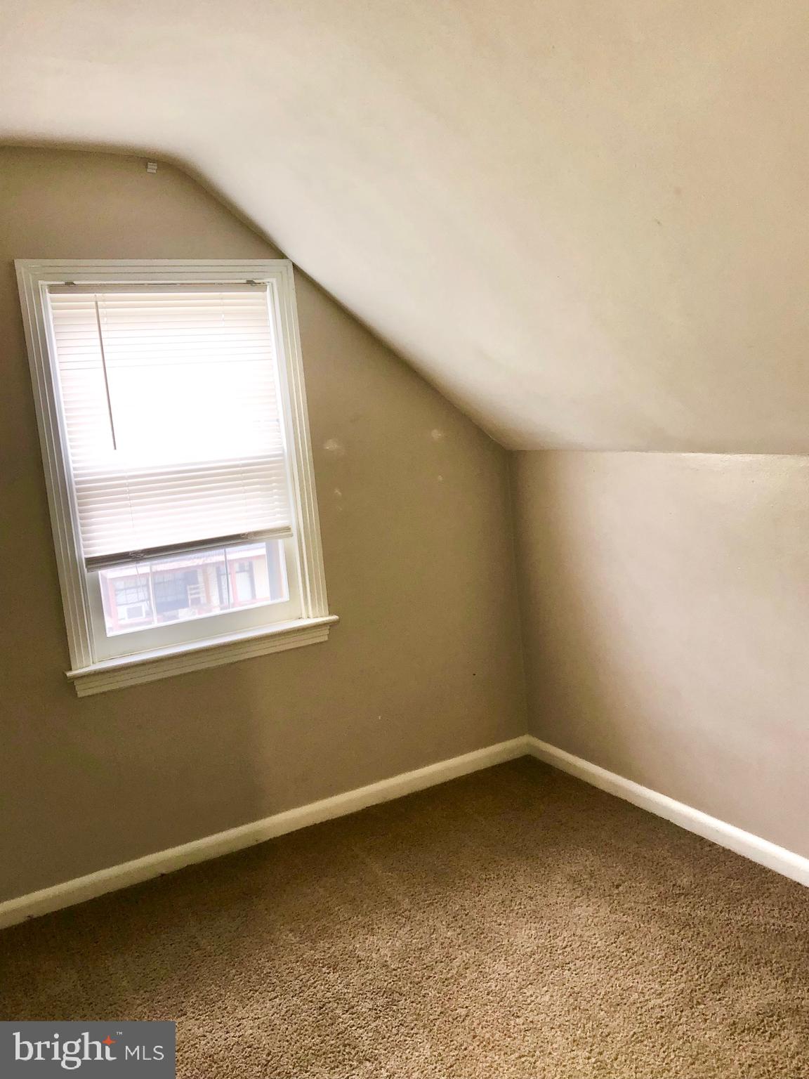 50 Dymond Avenue, Unit B Fayetteville, PA 17222 - Photo 18 of 23 an empty room with a window