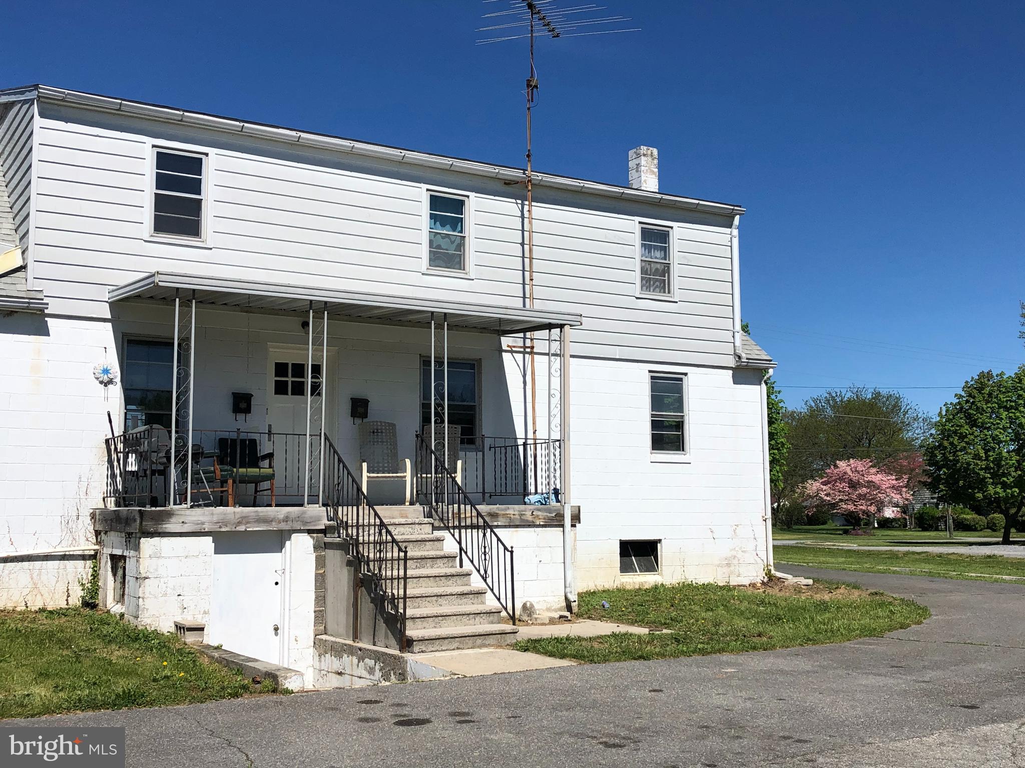 50 Dymond Avenue, Unit B Fayetteville, PA 17222 - Photo 2 of 23 a front view of a house with a garden