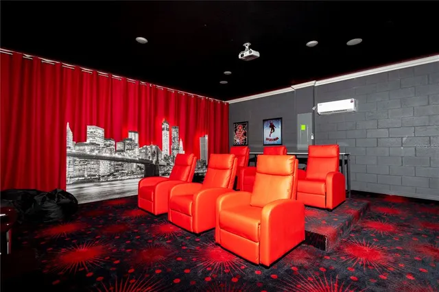 a living room with furniture ceiling fan and a window