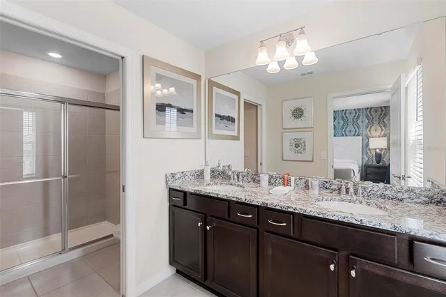 a bedroom with bed and a closet