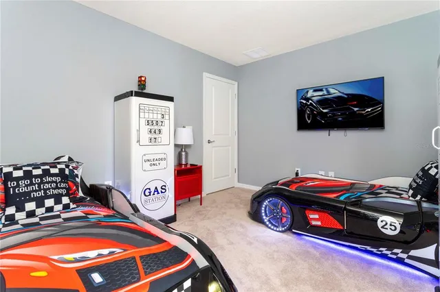 a swimming pool with outdoor seating and yard