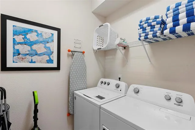 a view of front of house with sign board and yard