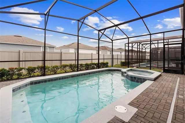 a room with gym equipment and a large window