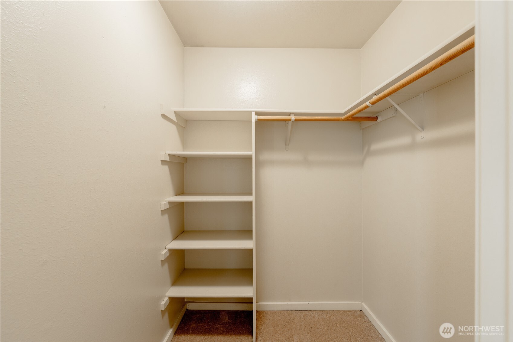12404 East Gibson Road, Unit Q201 Everett, WA 98204 - Photo 19 of 40 a view of walk in closet with empty racks