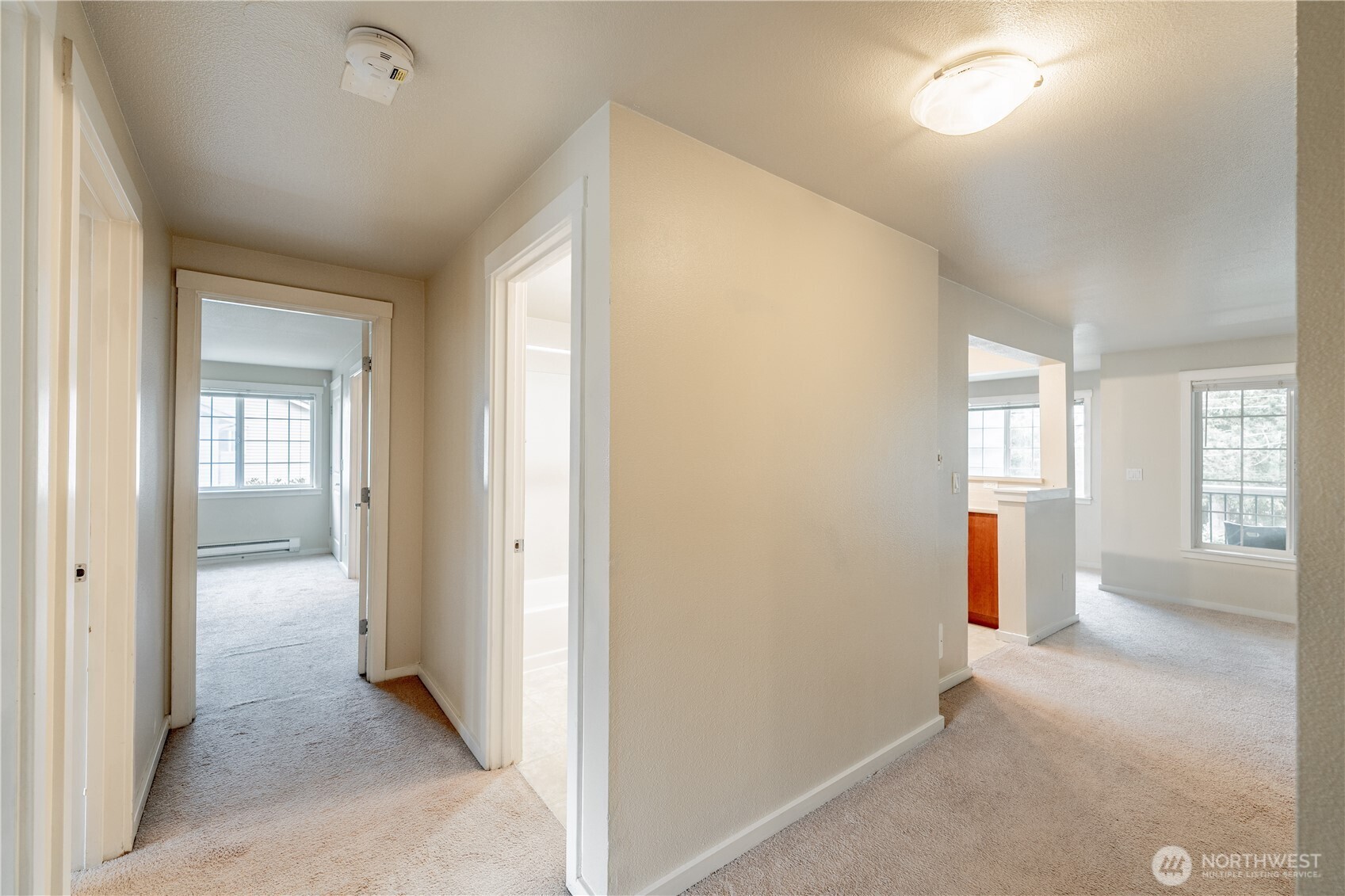 12404 East Gibson Road, Unit Q201 Everett, WA 98204 - Photo 20 of 40 an empty room with windows and closet