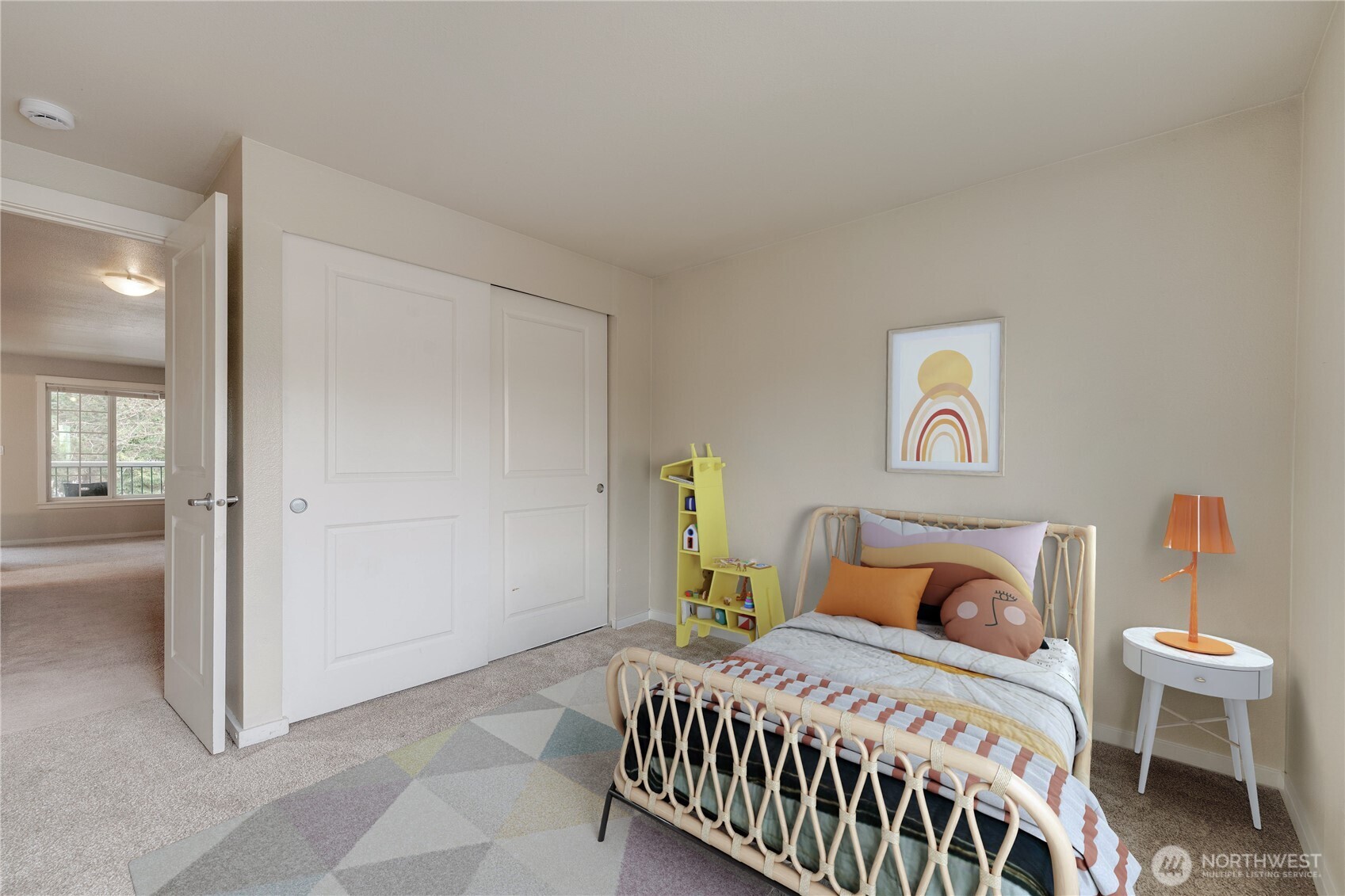 12404 East Gibson Road, Unit Q201 Everett, WA 98204 - Photo 23 of 40 a bedroom with a bed and a table