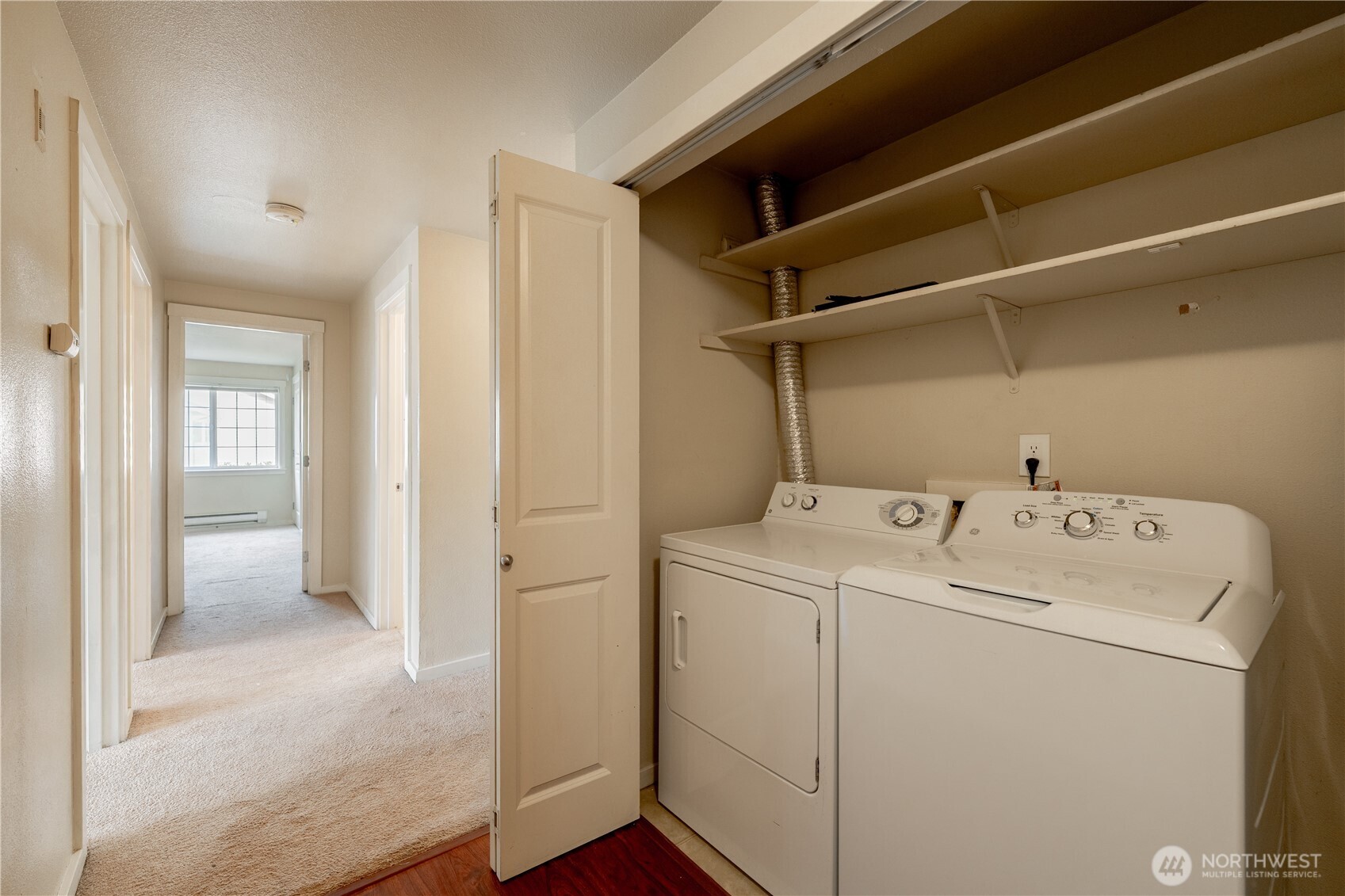 12404 East Gibson Road, Unit Q201 Everett, WA 98204 - Photo 27 of 40 a view of storage and utility room with washer and dryer