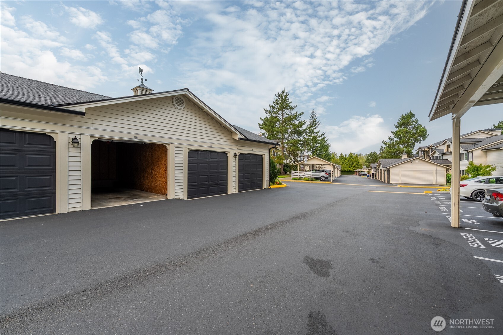 12404 East Gibson Road, Unit Q201 Everett, WA 98204 - Photo 30 of 40 a view of a house with a street