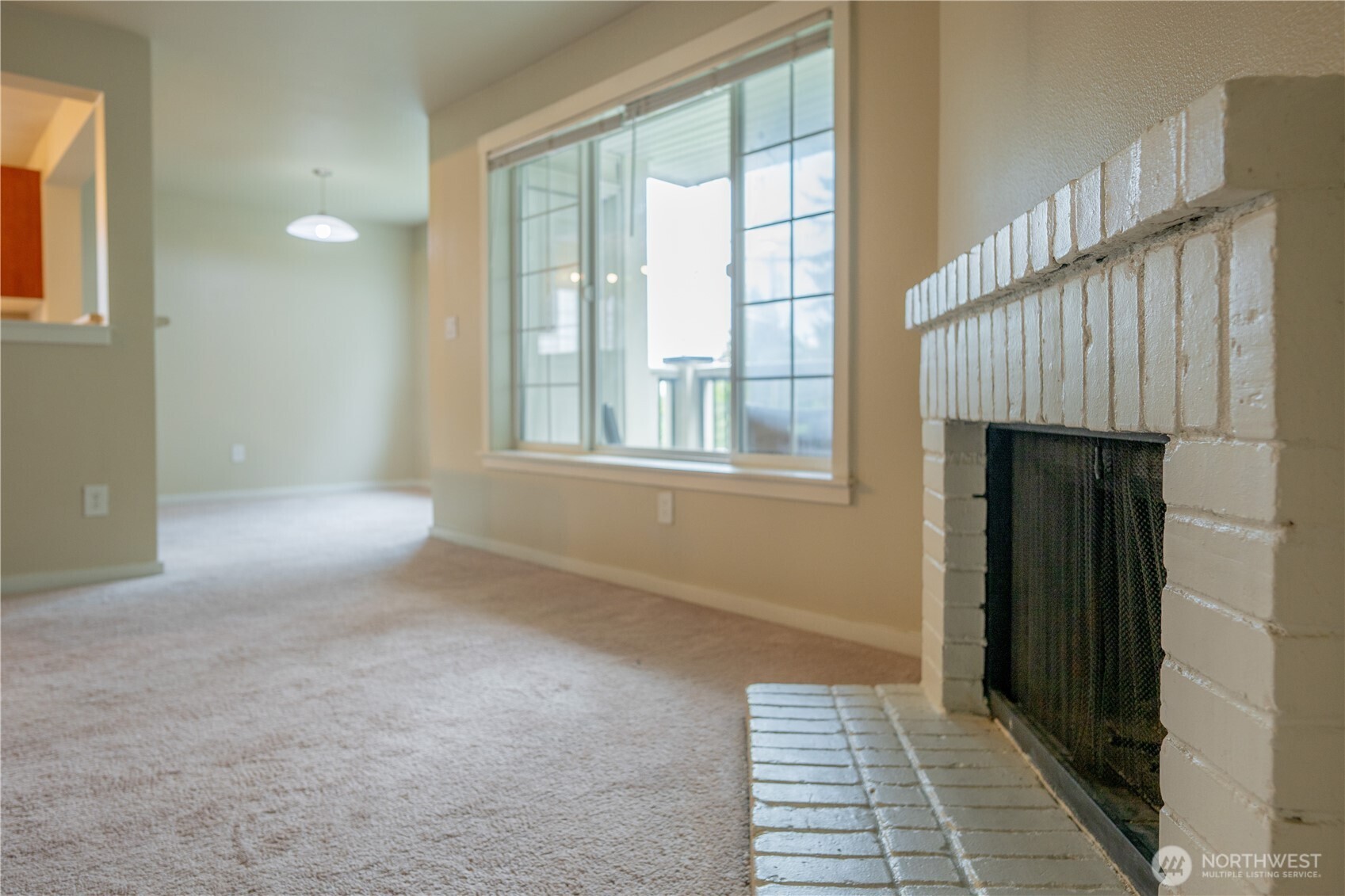 12404 East Gibson Road, Unit Q201 Everett, WA 98204 - Photo 3 of 40 wooden floor in an empty room with a window