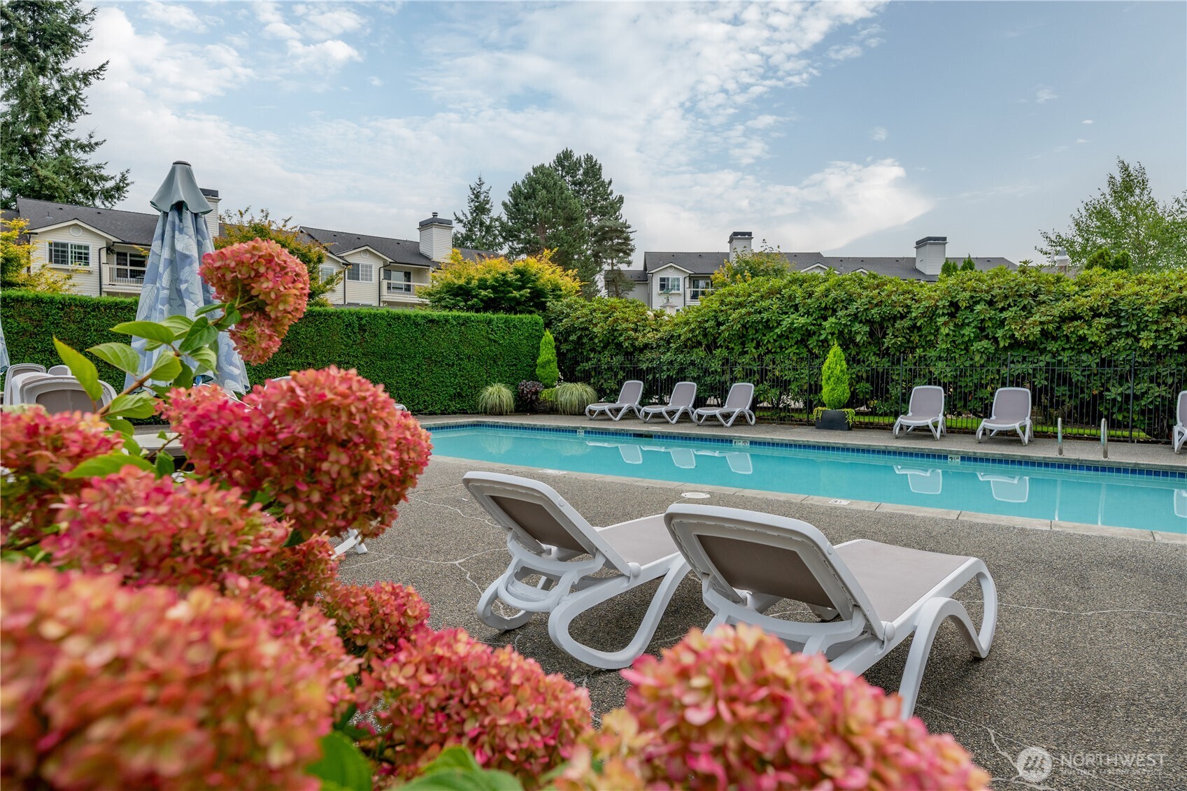 12404 East Gibson Road, Unit Q201 Everett, WA 98204 - Photo 33 of 40 a view of a swimming pool with a patio