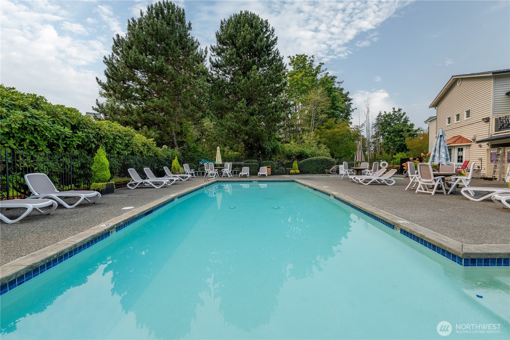 12404 East Gibson Road, Unit Q201 Everett, WA 98204 - Photo 34 of 40 a view of swimming pool with chairs