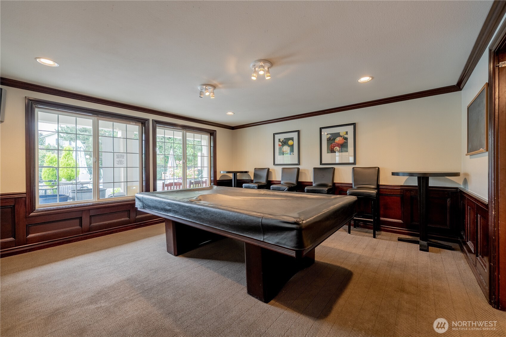 12404 East Gibson Road, Unit Q201 Everett, WA 98204 - Photo 37 of 40 a living room with furniture a flat screen tv and a large window