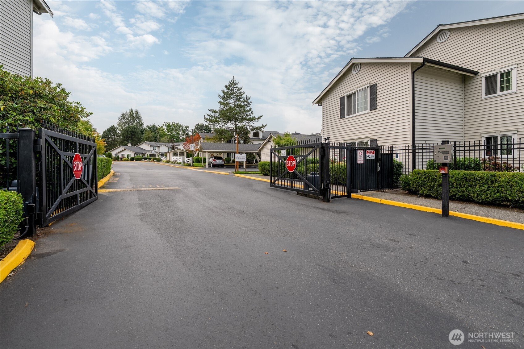 12404 East Gibson Road, Unit Q201 Everett, WA 98204 - Photo 39 of 40 a view of a house with a street