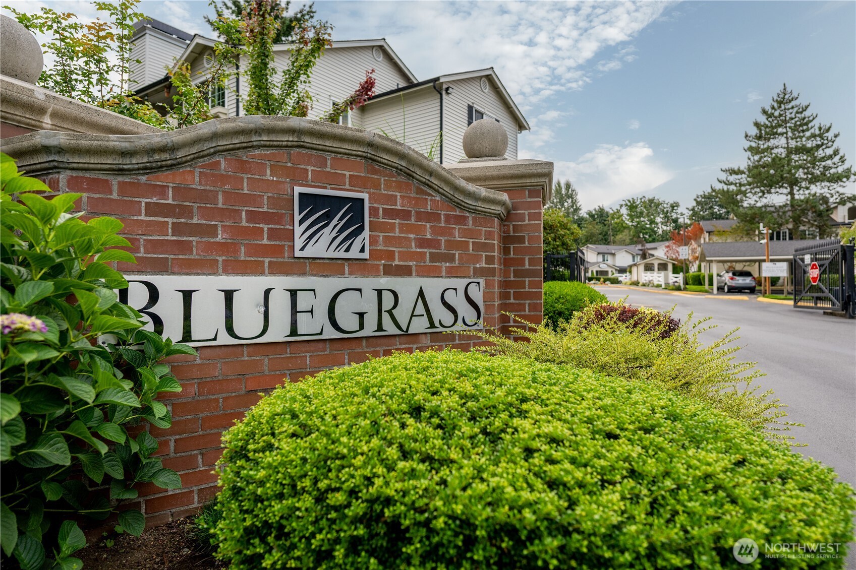 12404 East Gibson Road, Unit Q201 Everett, WA 98204 - Photo 40 of 40 a view of sign board with buildings in background