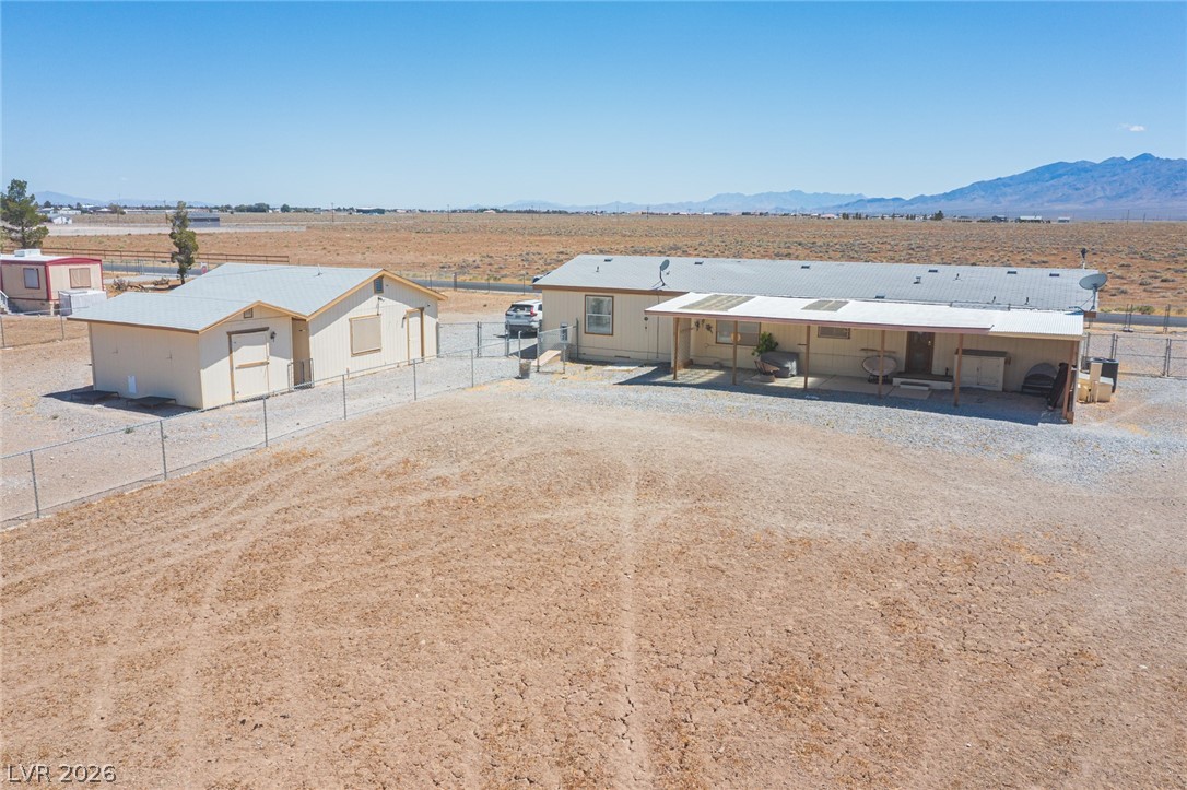 3200 Maple Road Pahrump, NV 89048 - Photo 52 of 53 A spacious desert property offering ample room for potential landscaping and expansion.