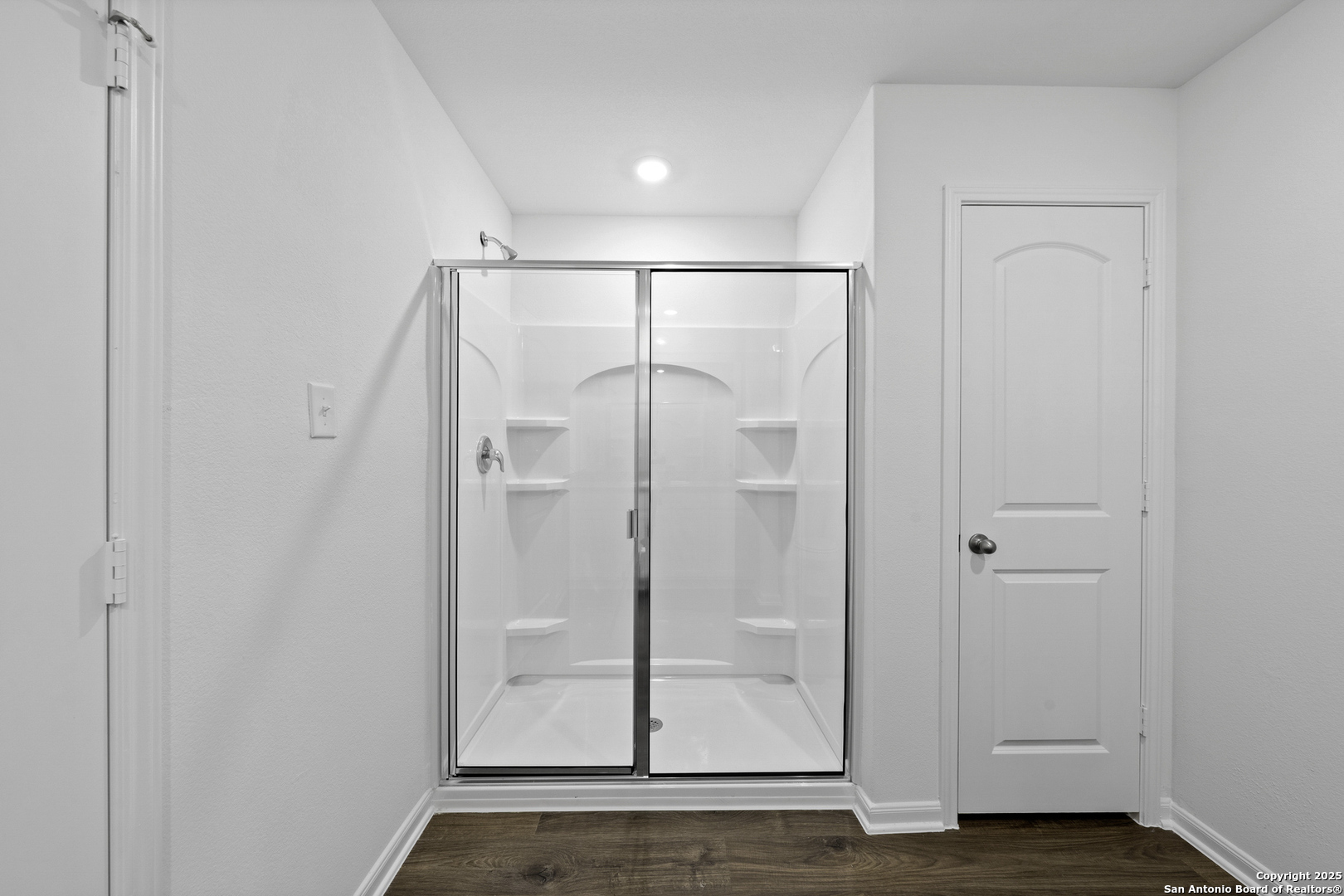 16004 Stratford Cove Lytle, TX 78052 - Photo 12 of 29 a bathroom with a shower