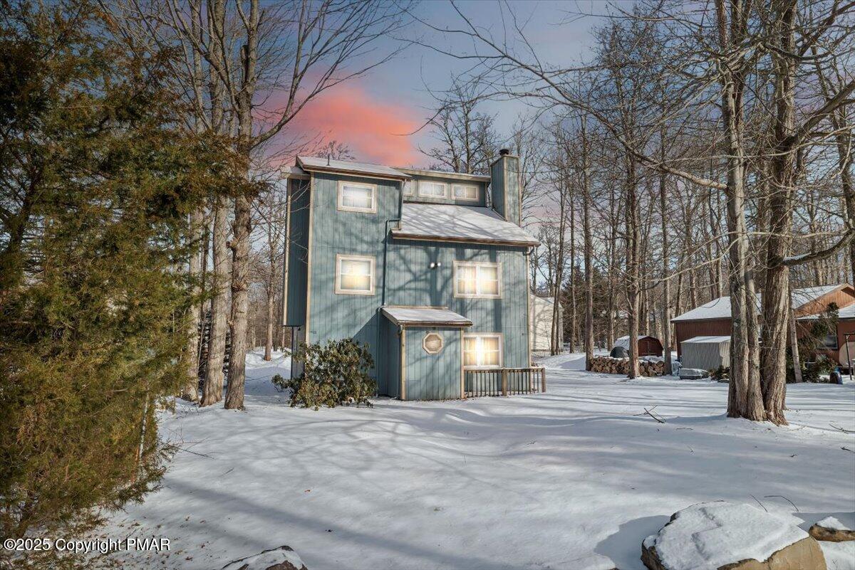 1662 Cotswald Road Tobyhanna, PA 18466 - Photo 1 of 43 a front view of a house with a yard and garage