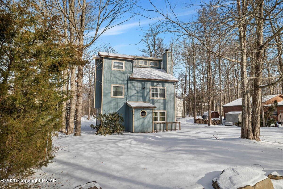 1662 Cotswald Road Tobyhanna, PA 18466 - Photo 2 of 43 a view of a house with a tree in front