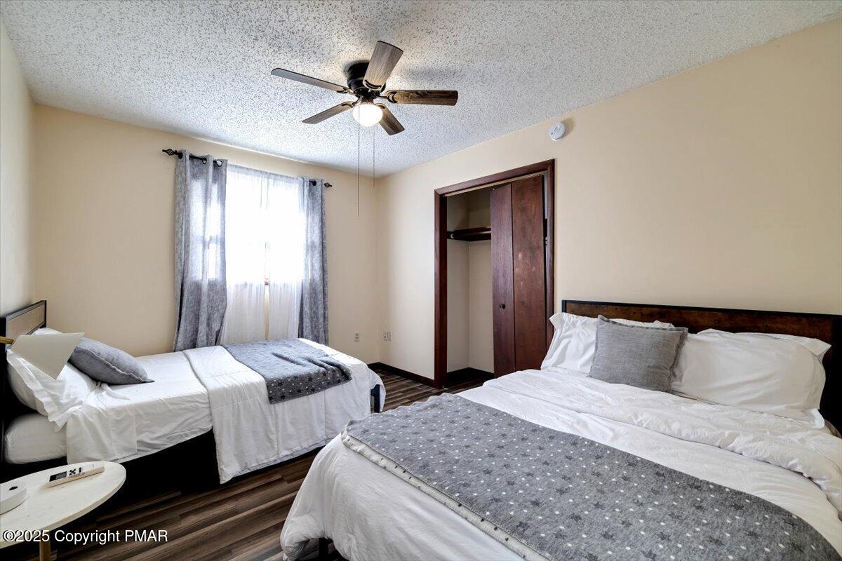 1662 Cotswald Road Tobyhanna, PA 18466 - Photo 26 of 43 a bedroom with two beds and ceiling fan