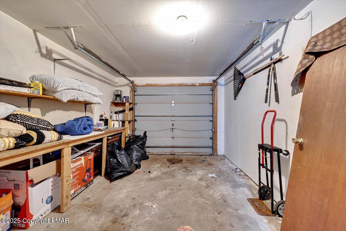 1662 Cotswald Road Tobyhanna, PA 18466 - Photo 39 of 43 a view of walk in closet with clothes and shoes