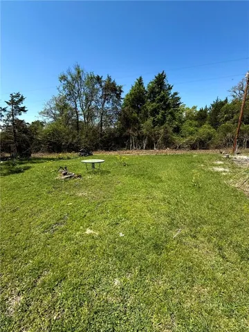 a view of outdoor space and yard