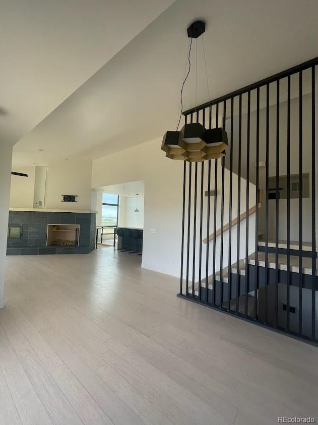 43010 Ptarmigan Rnch Street Parker, CO 80138 - Photo 13 of 15 a view of empty room with a fireplace