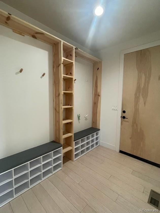 43010 Ptarmigan Rnch Street Parker, CO 80138 - Photo 14 of 15 a view of an empty room with wooden floor and closet