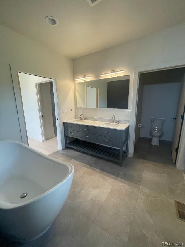43010 Ptarmigan Rnch Street Parker, CO 80138 - Photo 9 of 15 a bathroom with a bathtub and sink