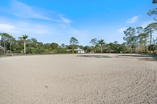 an aerial view of residential house with outdoor space