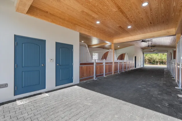 a view of house with outdoor space and swimming pool