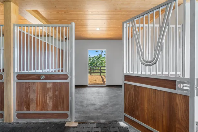a large white kitchen with lots of counter space