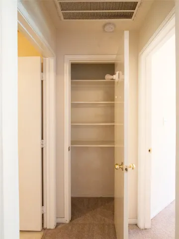 a bathroom with a sink toilet and vanity