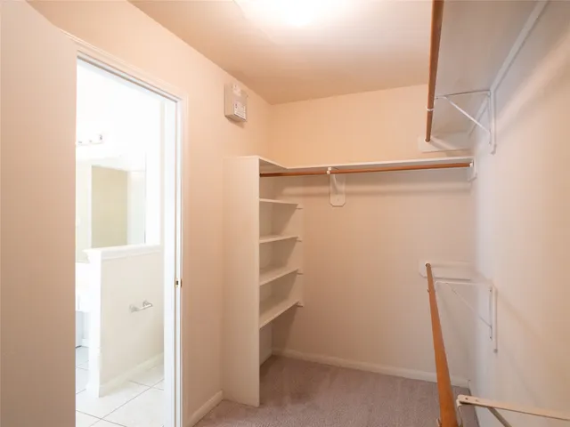 a bathroom with a shower and a shower