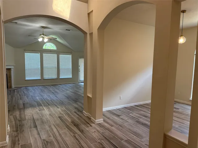 a kitchen with a stove a sink and a refrigerator