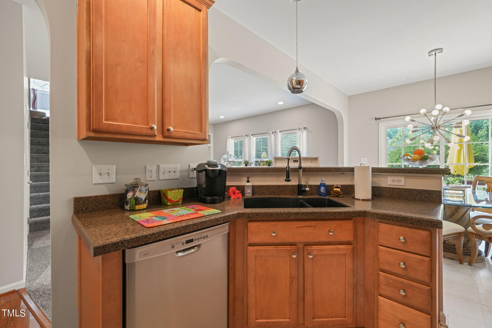 3509 Weir Way Raleigh, NC 27616 - Photo 7 of 52 a kitchen with stainless steel appliances granite countertop a sink a stove and cabinets