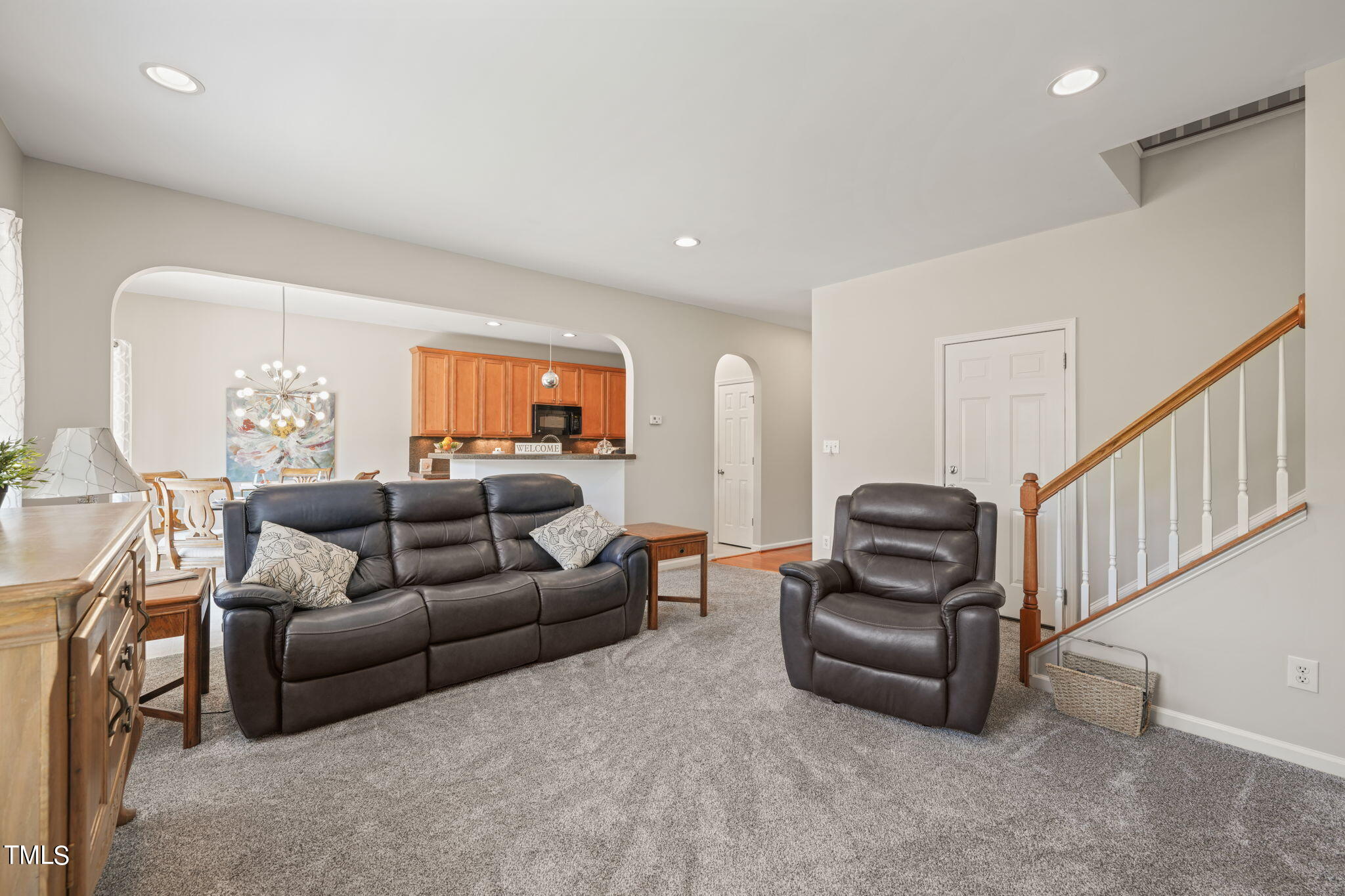 3509 Weir Way Raleigh, NC 27616 - Photo 9 of 52 a living room with furniture and a flat screen tv
