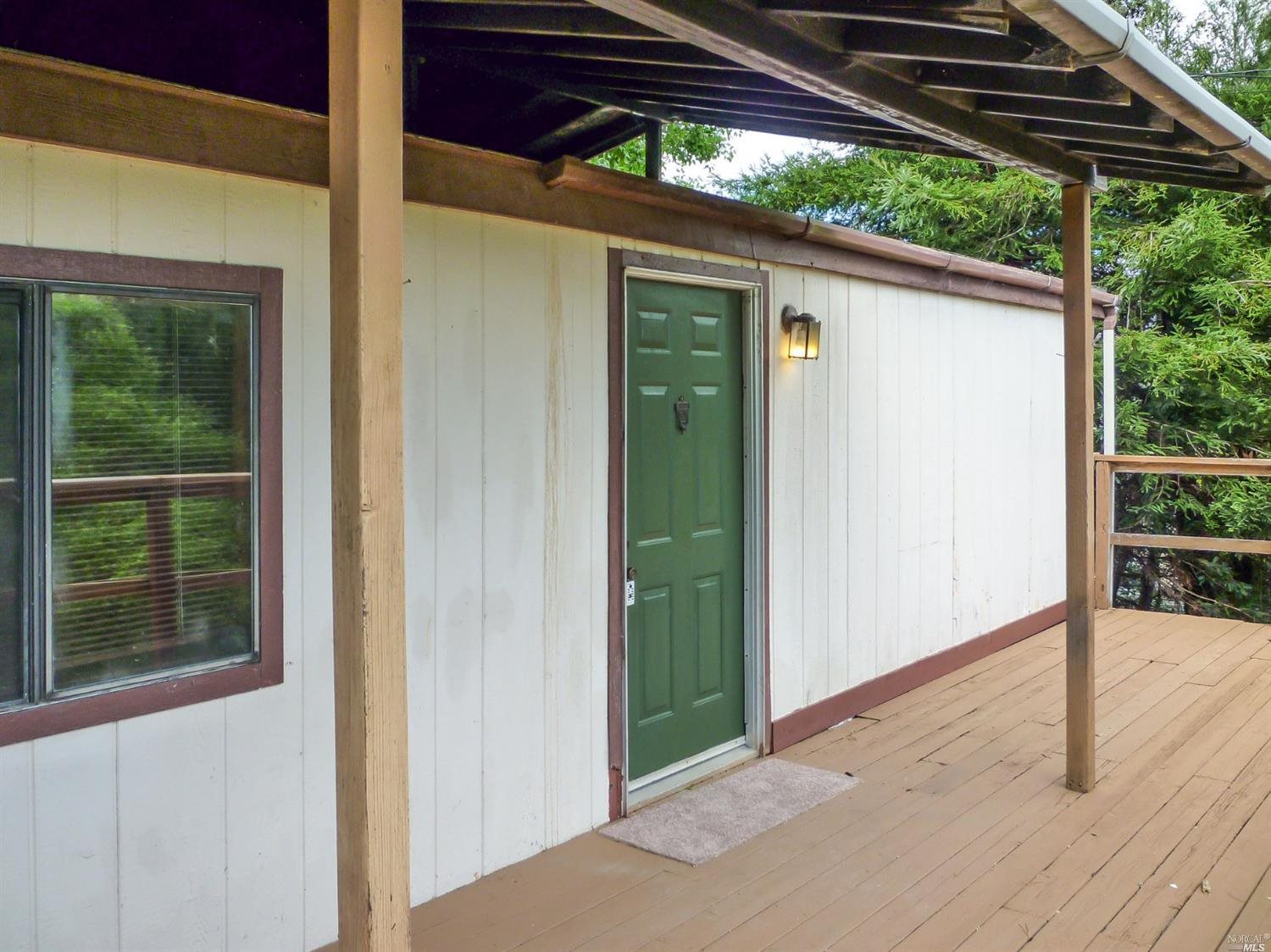 2420 Blucher Valley Road Sebastopol, CA 95472 - Photo 1 of 1 a backyard of a house with wooden floor