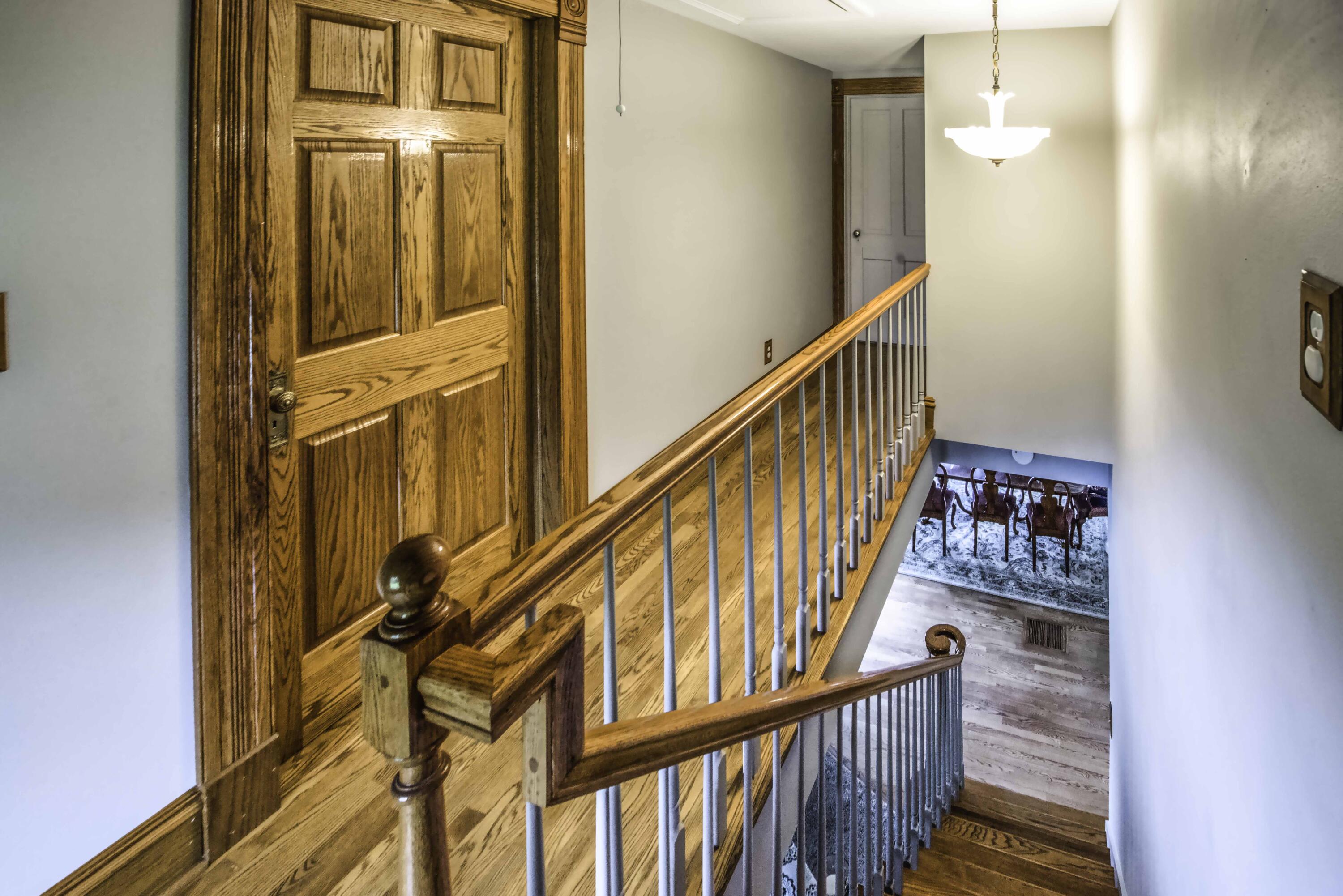 N14-w28039 Silvernail Road Delafield, WI 53072 - Photo 16 of 28 Silvernail Hallway and stairs