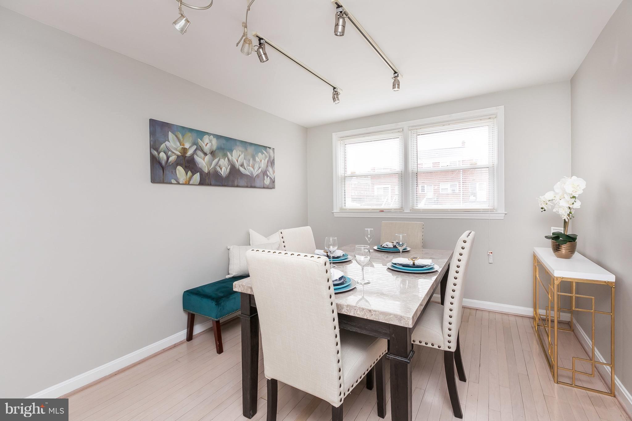 1504 Clairidge Road Baltimore, MD 21207 - Photo 7 of 30 a view of a dining room with furniture and window